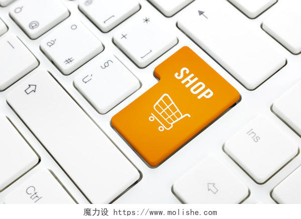店里的经营理念 橙色购物车按钮或摄影白色键盘上的键购物平台